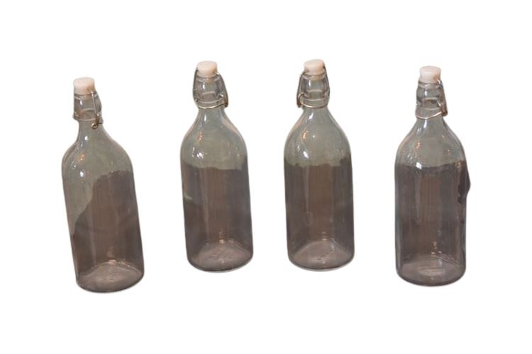 Four (4) Glass Bottles