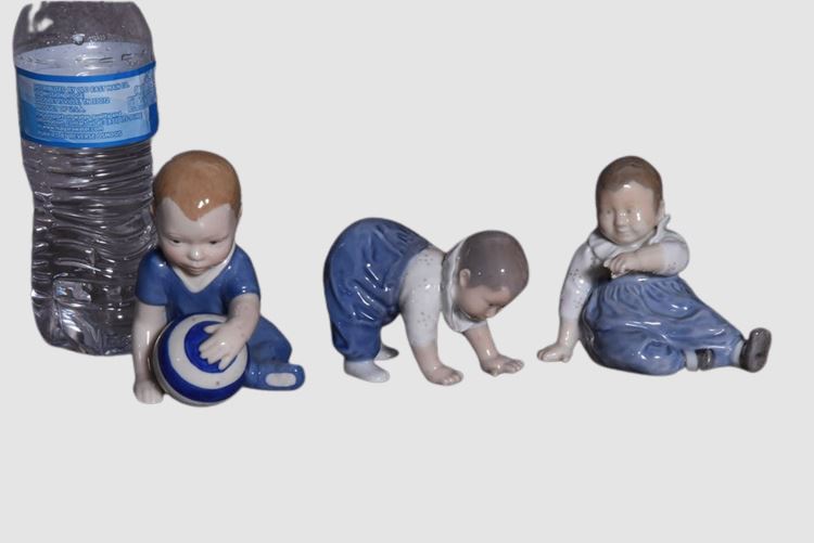 Three (3) Royal Copenhagen Child Figurines