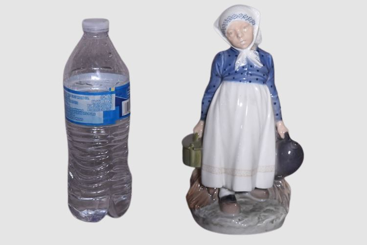 Royal Copenhagen Peasant Girl with Lunch Figurine