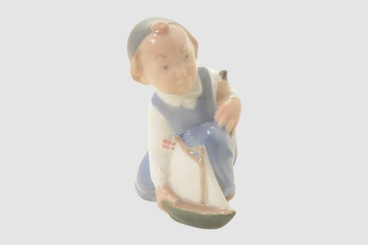 Royal Copenhagen Little BOY w/ Toy SAILBOAT by Aage Erhardt Porcelain Figurine