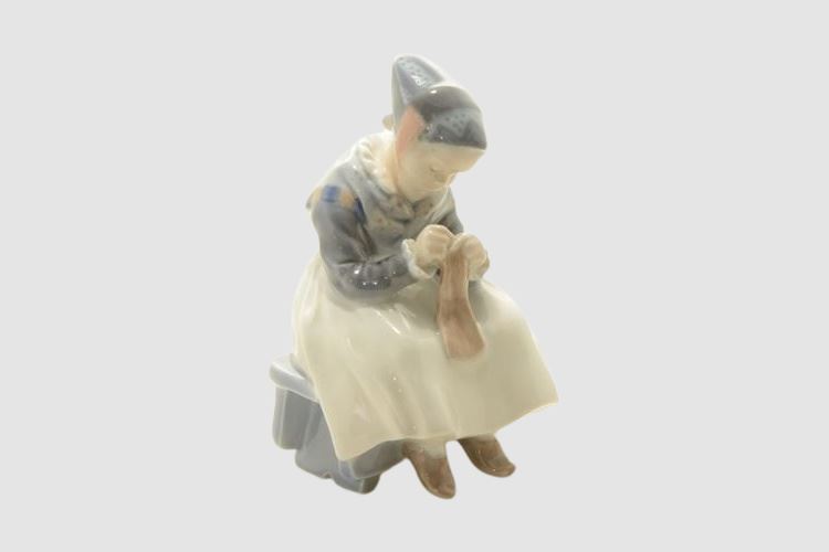 Royal Copenhagen Porcelain Figurine of a Sewing Woman