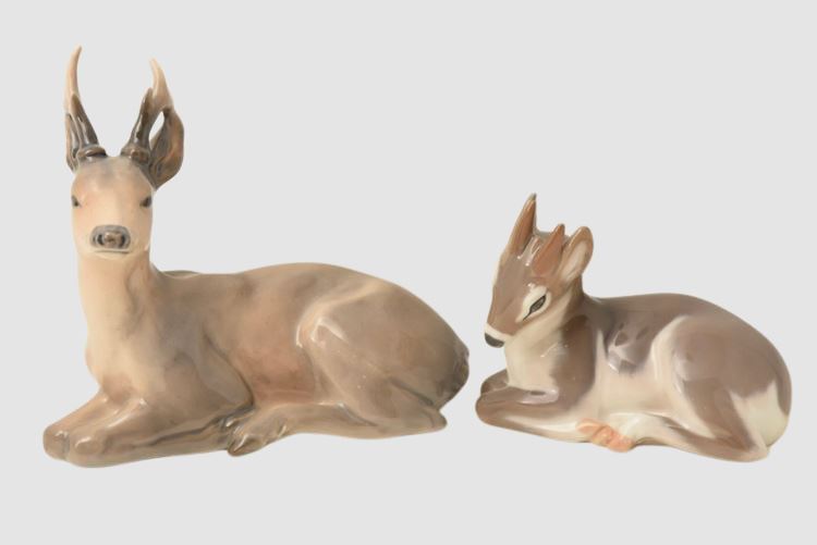 Deer lying down Royal Copenhagen figurine  Kid with its head down