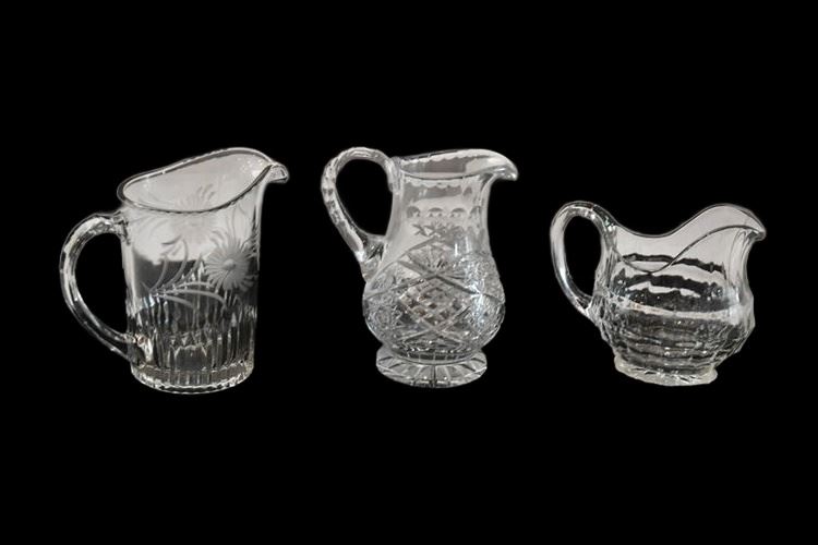 Three (3) Glass Pitchers