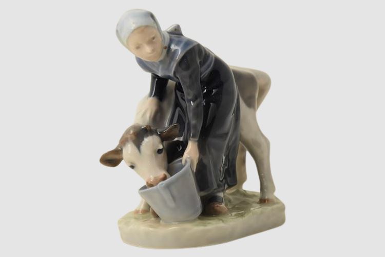 Royal Copenhagen Porcelain Woman with Cow