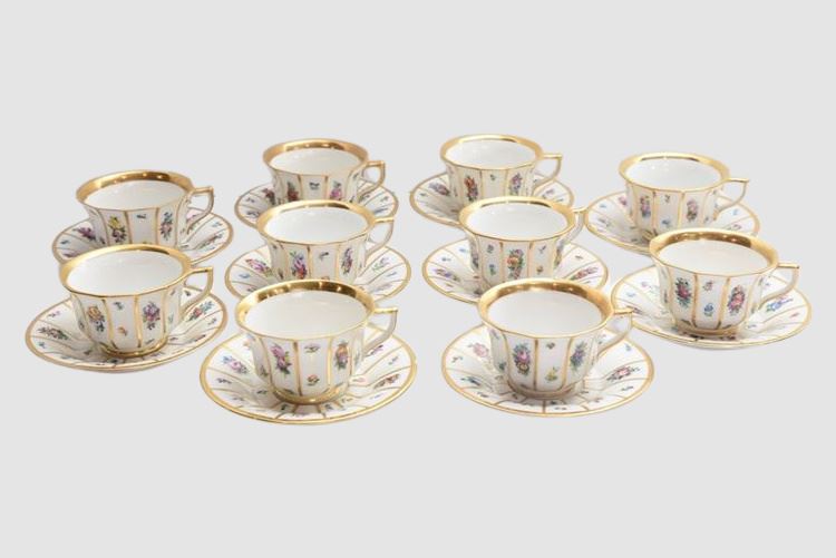 Royal Copenhagen, Henriette mocha cups and saucers hand-painted with flowers