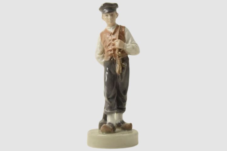 Royal Copenhagen hand-painted porcelain figurine Young Man with Sledgehammer