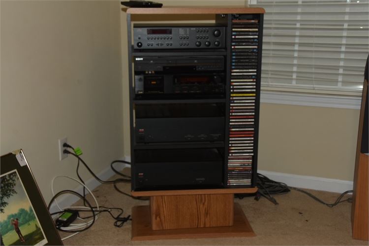 Audio Equipment With Modern Stand and Contents