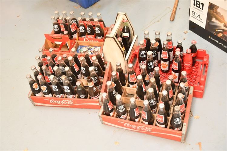 Group Vintage Coca Cola Bottles and Crates