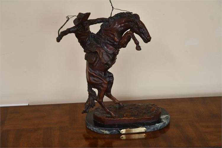 Contemporary 20th C. Frederick Remington bronze. "Bronco Buster".