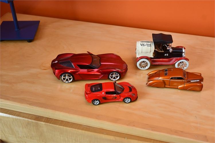 Four (4) Toy Cars