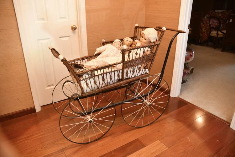 Antique Wicker Baby Carriage and Three Dolls