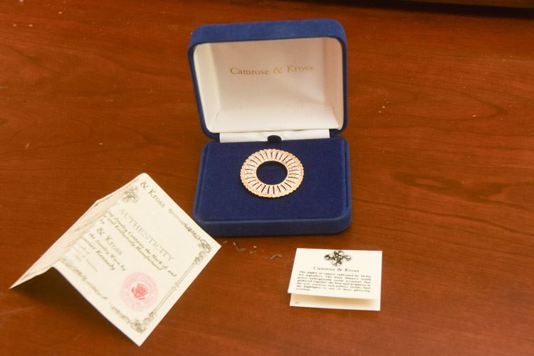 Camrose & Kross Jacqueline Kennedy brooch known as the Virginia Reel Circle Pin.
