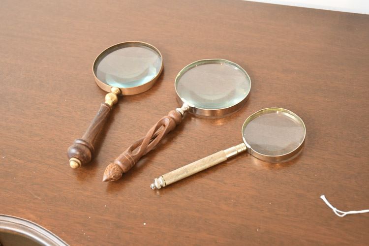 Three Hand Held Magnifying Glasses