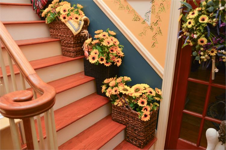 Faux Flowers in Stair Baskets