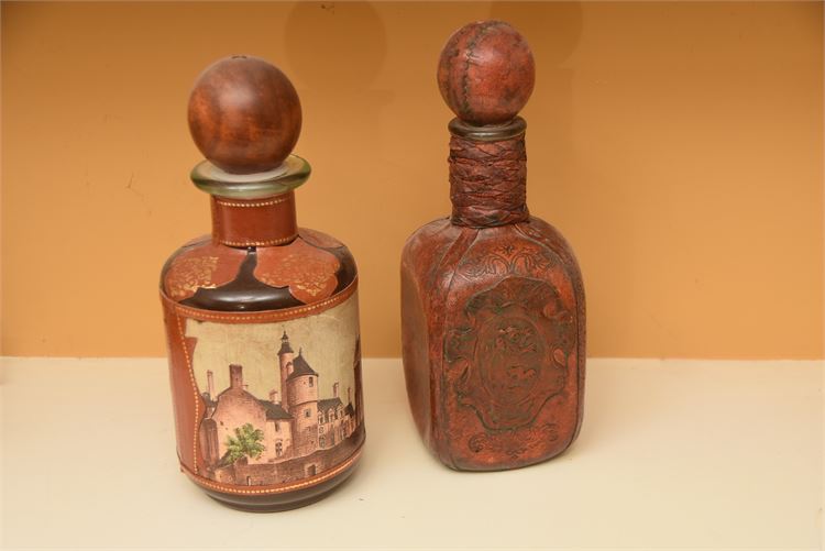 Two (2) Leather covered Flask