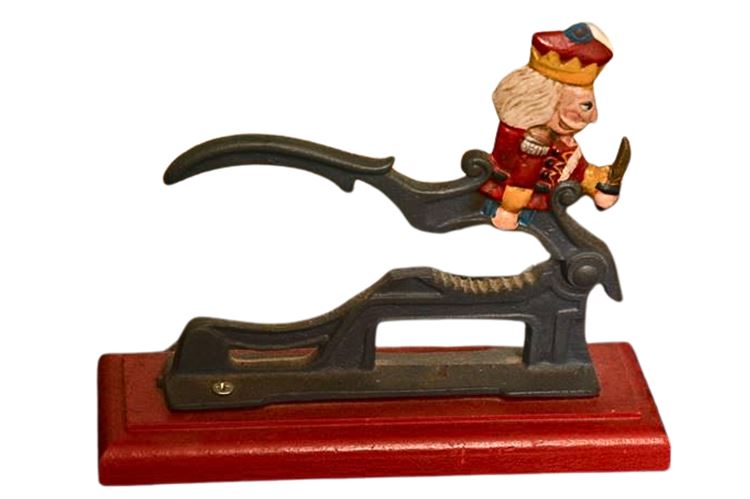 Cast Iron on Wood Base Nutcracker