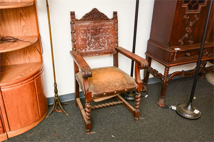 Carved Antique Leather Upholstered Arm Chair