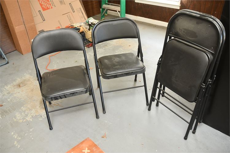 Four Folding Chairs