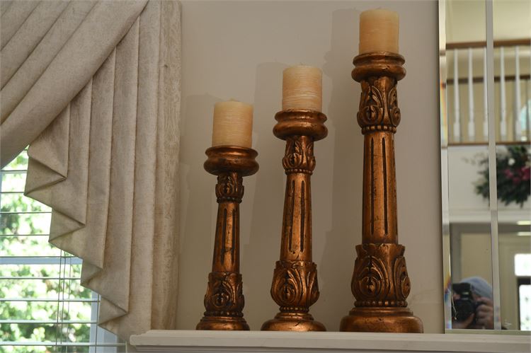 Three Graduated Height Candlesticks