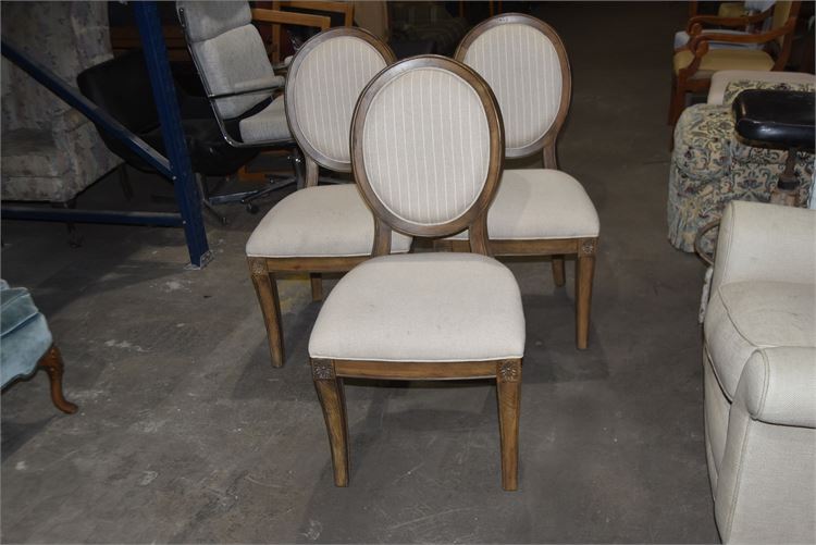 Three upholstered ballroom chairs