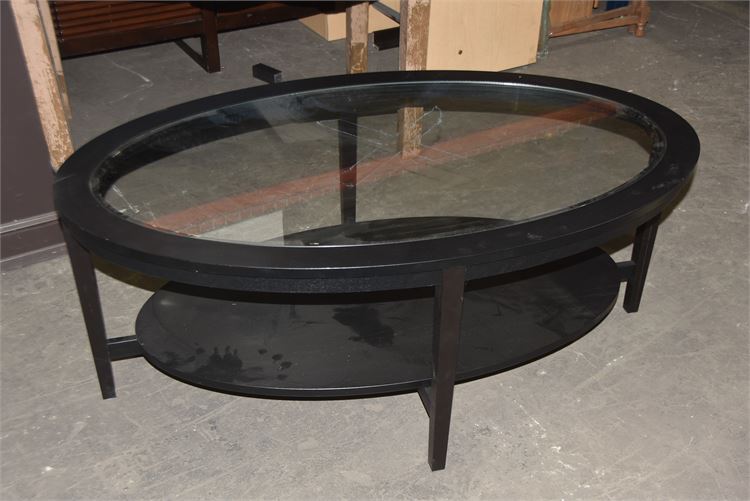 Black oval glass top coffee table