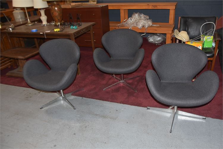 Three modern gray chairs