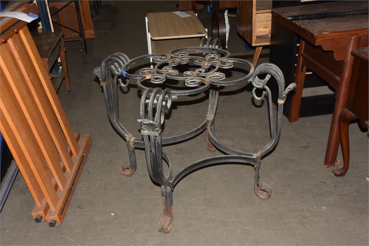 Elaborate wrought iron table base