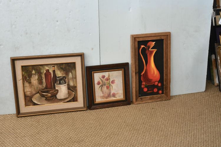 Three framed artworks