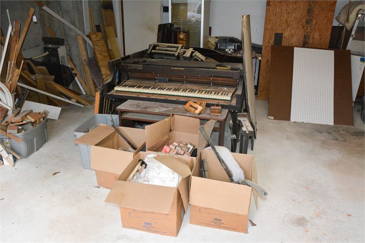 Piano and Boxes Filled with Parts or Electrical Components