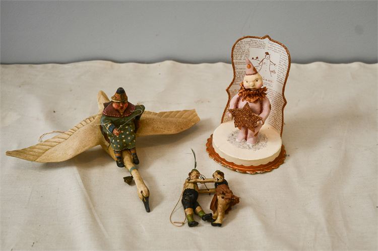 Three (3) Figurines: Swan, Clown , Two Figures Pulling a Rope