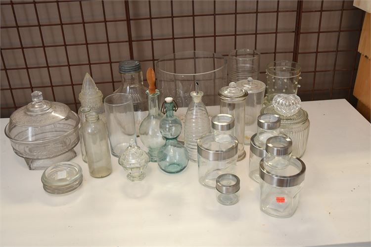 Various Clear Glass Bottles, Jars, and Vases