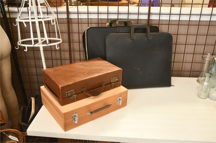 Four (4) Vintage Leather Suitcases