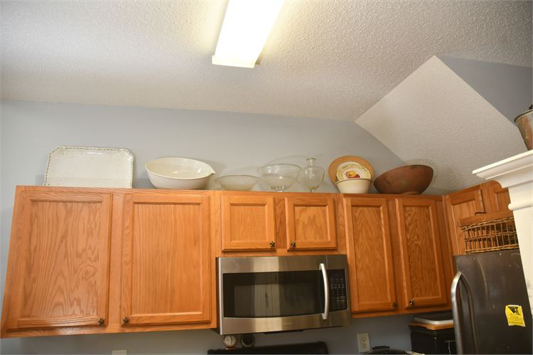 Glassware an Bowls on Top of Cabinets