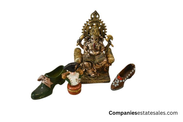 Statue of Sri Ganesha, Napoleon pill box and Small shoe