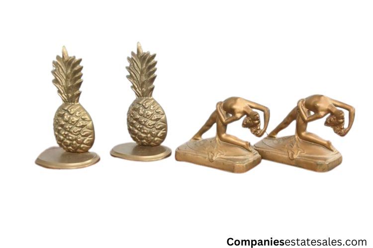 Four (4) Vintage Brass Pineapple and French Style Art Deco Figural Nude Bookends