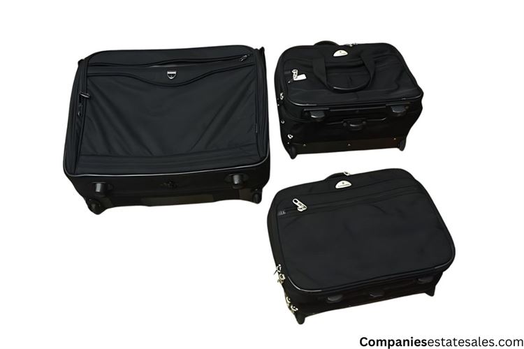 Three (3) Black Rolling Suitcases