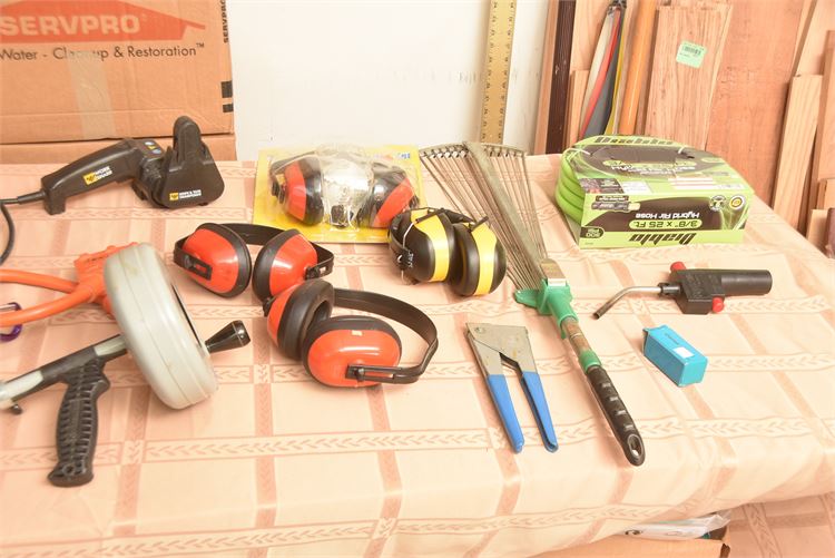 Tools: Earmuffs, Plumbing Snake, Metal Rake, Hose and Torch